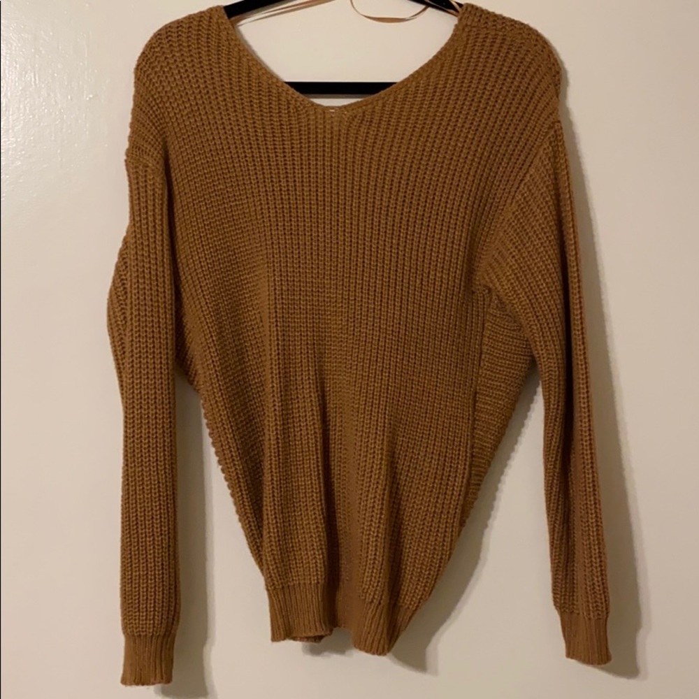 Brown sweater with knot on back